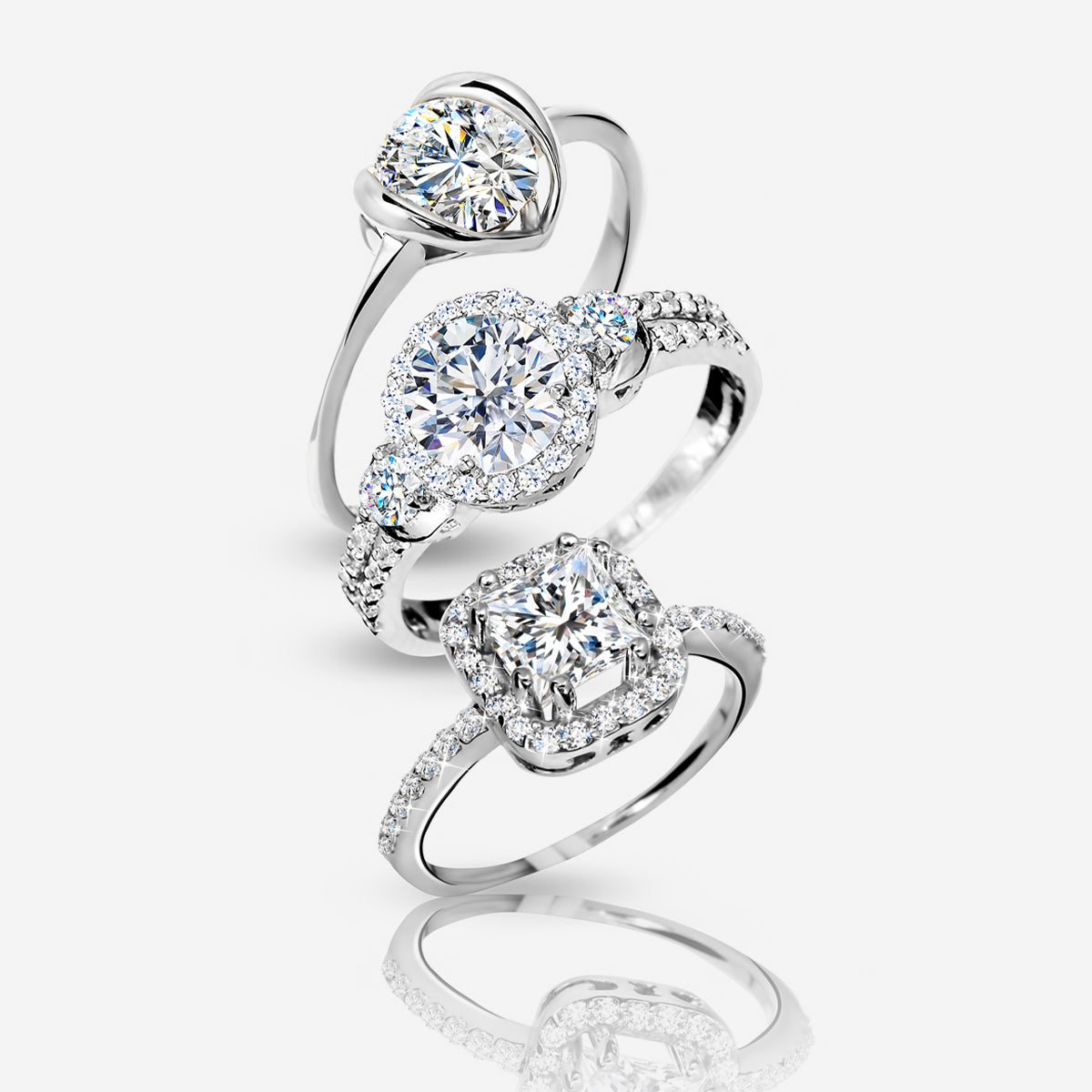Three diamond rings with white gold settings