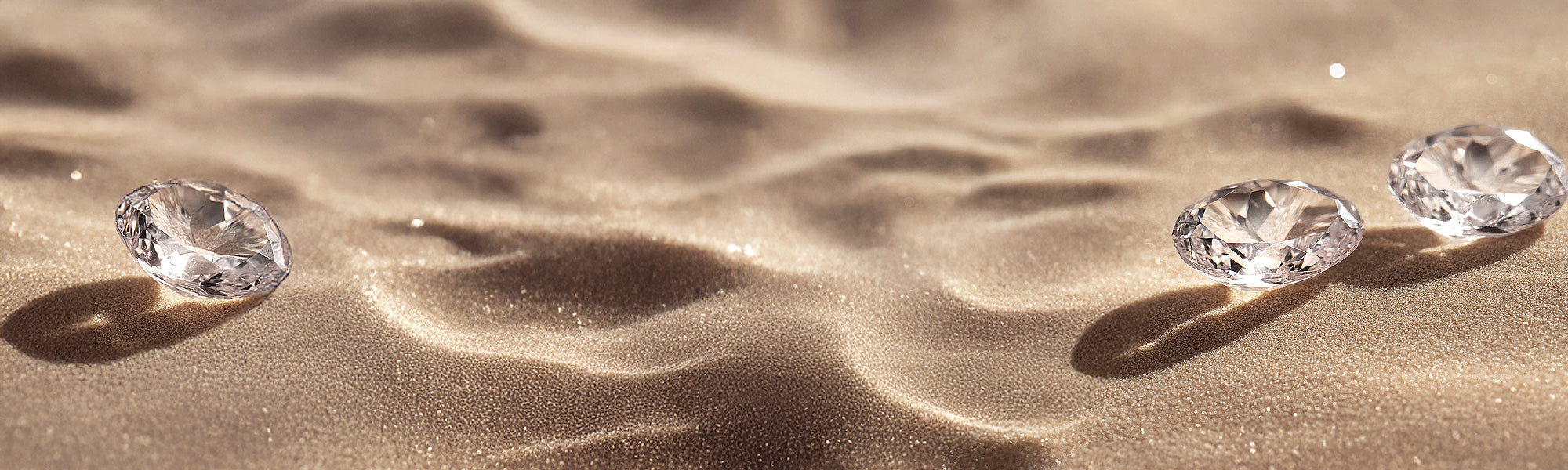 oval cut diamonds on sand