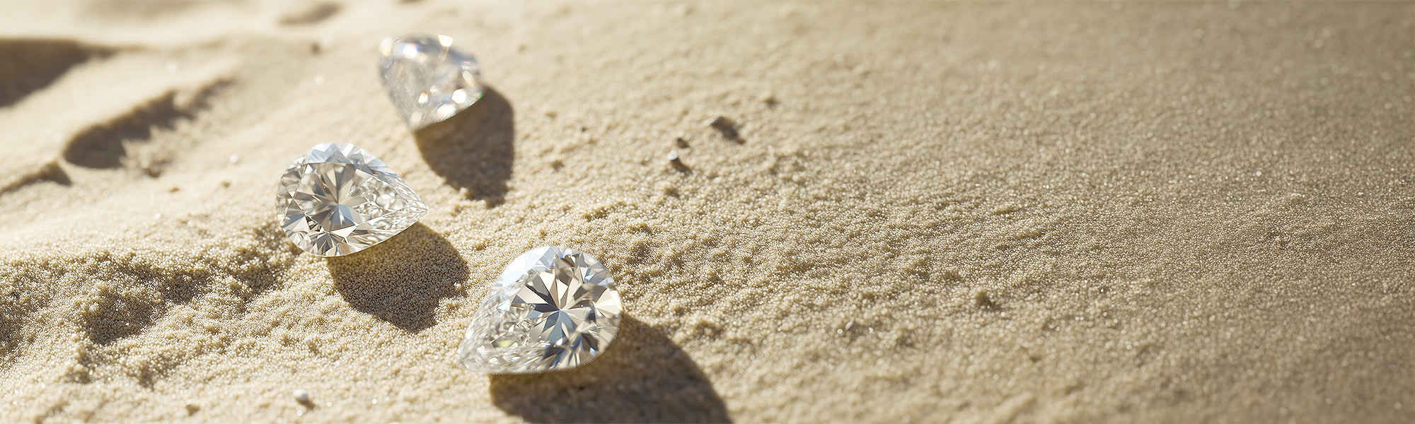 pear diamonds on sand