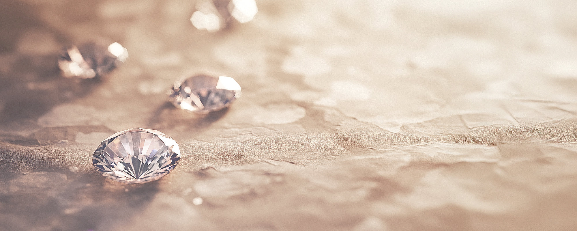 round brillaint cut diamonds on paper surface