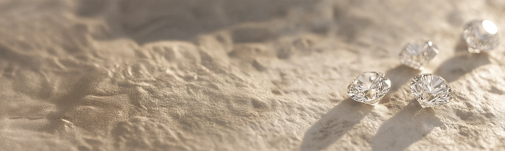 round brilliant cut diamonds on sand